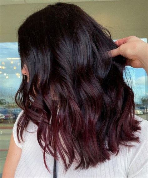 burgundy hair color boy|black hair with burgundy highlights.